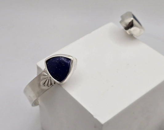 Blue Teapot Jewelry sterling silver cuff bracelet featuring triangular lapis lazuli stones with vintage detailing.